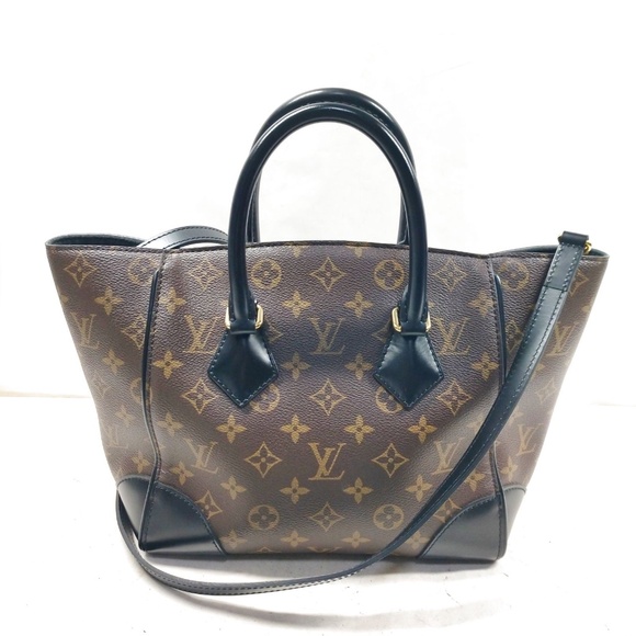 LOUIS VUITTON - Phoenix PM R1.283 - Picture 1 of 4